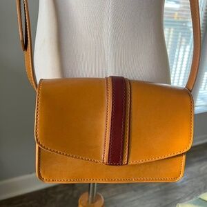 Tan and burgundy leather crossbody bag